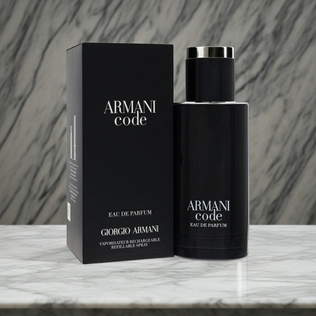 AuraGlow Armani Code Eau De Parfum 4.2oz bottle and black box packaging on a white marble surface.