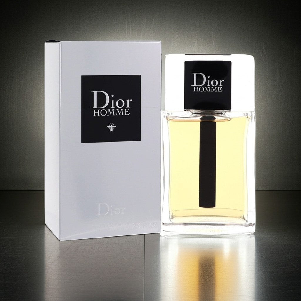 AuraGlow Dior Homme Eau De Toilette 3.4oz fragrance bottle and white box packaging on a reflective surface