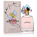 AuraGlow Marc Jacobs Perfect Eau De Parfum 3.3oz bottle with whimsical charm cap next to its illustrated gift box.