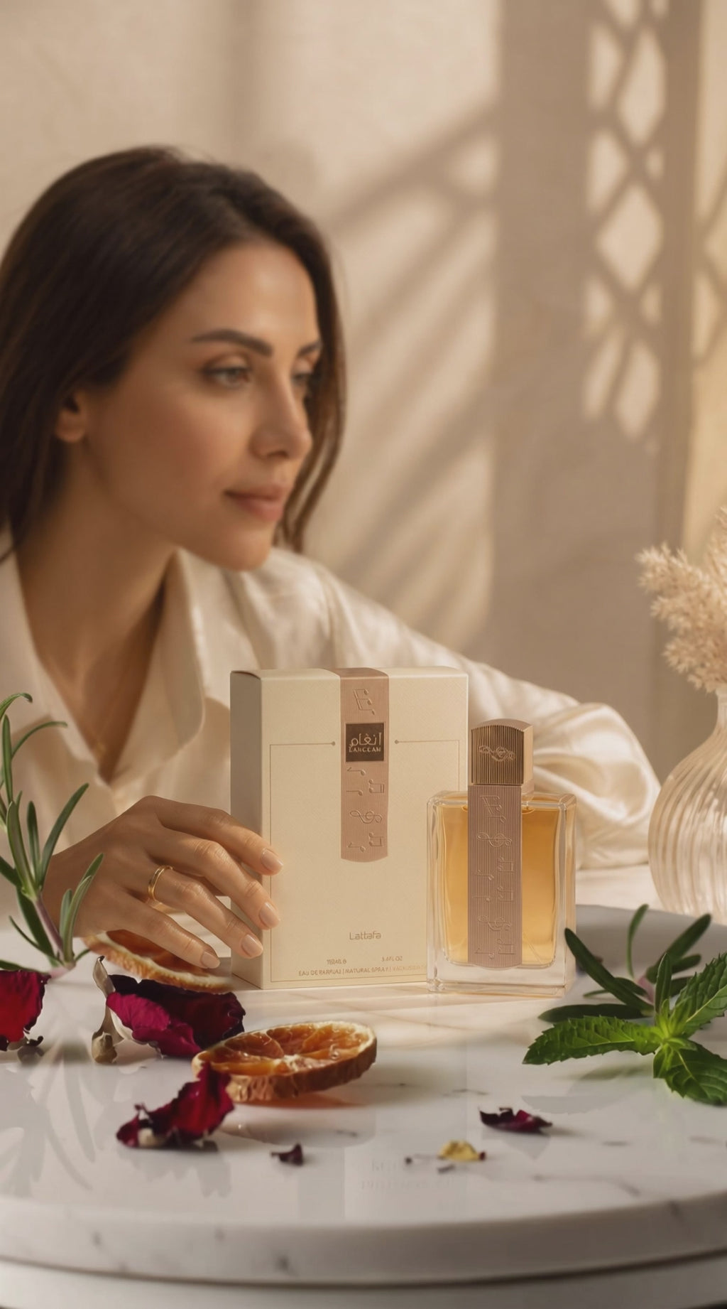 Lattafa Angham by Lattafa Eau De Parfum Spray (Unisex) 3.4 oz (Women)
